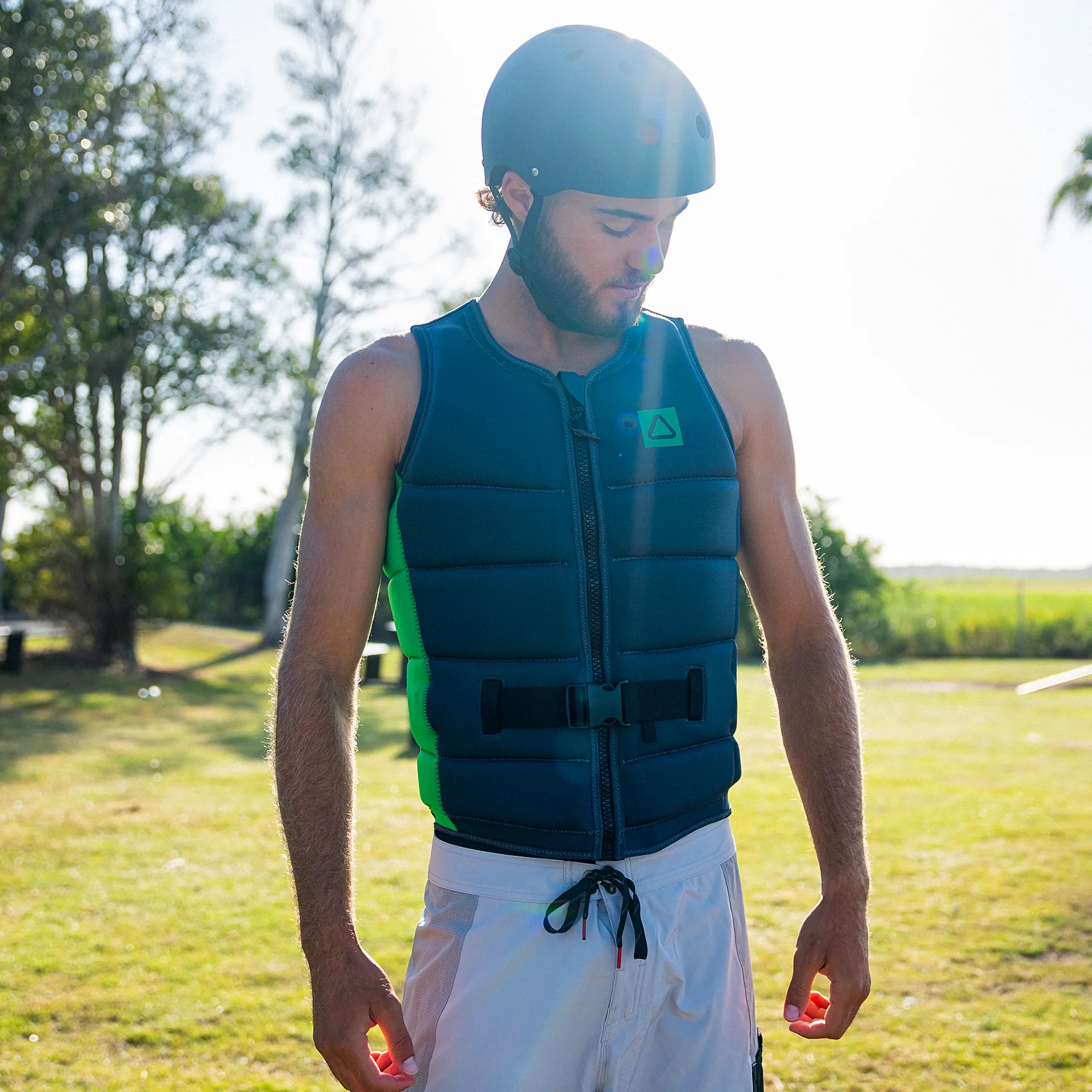 Follow Corp Men's Life Jacket - Black/Green in use