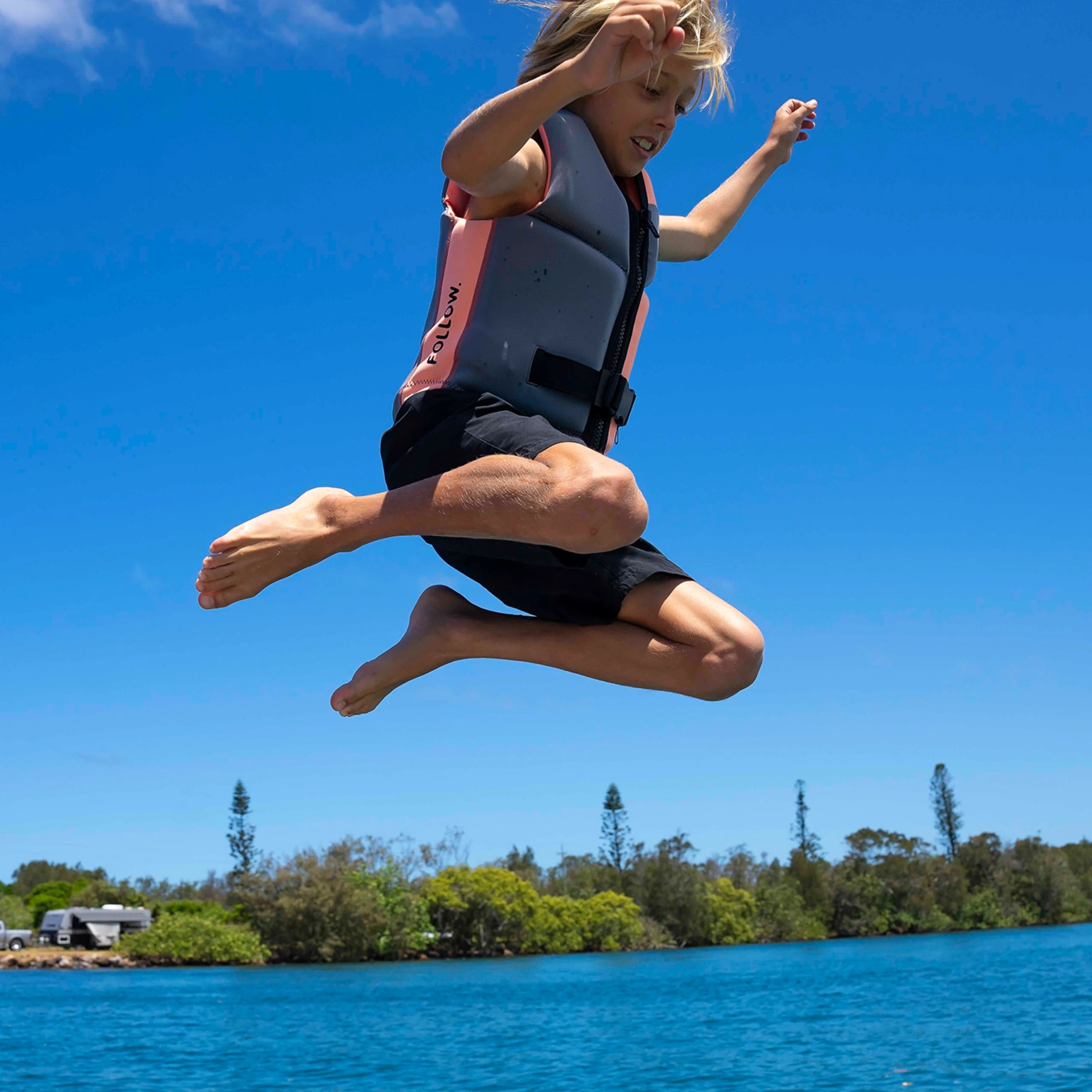 Follow Corp Junior Life Jacket - Melon in use