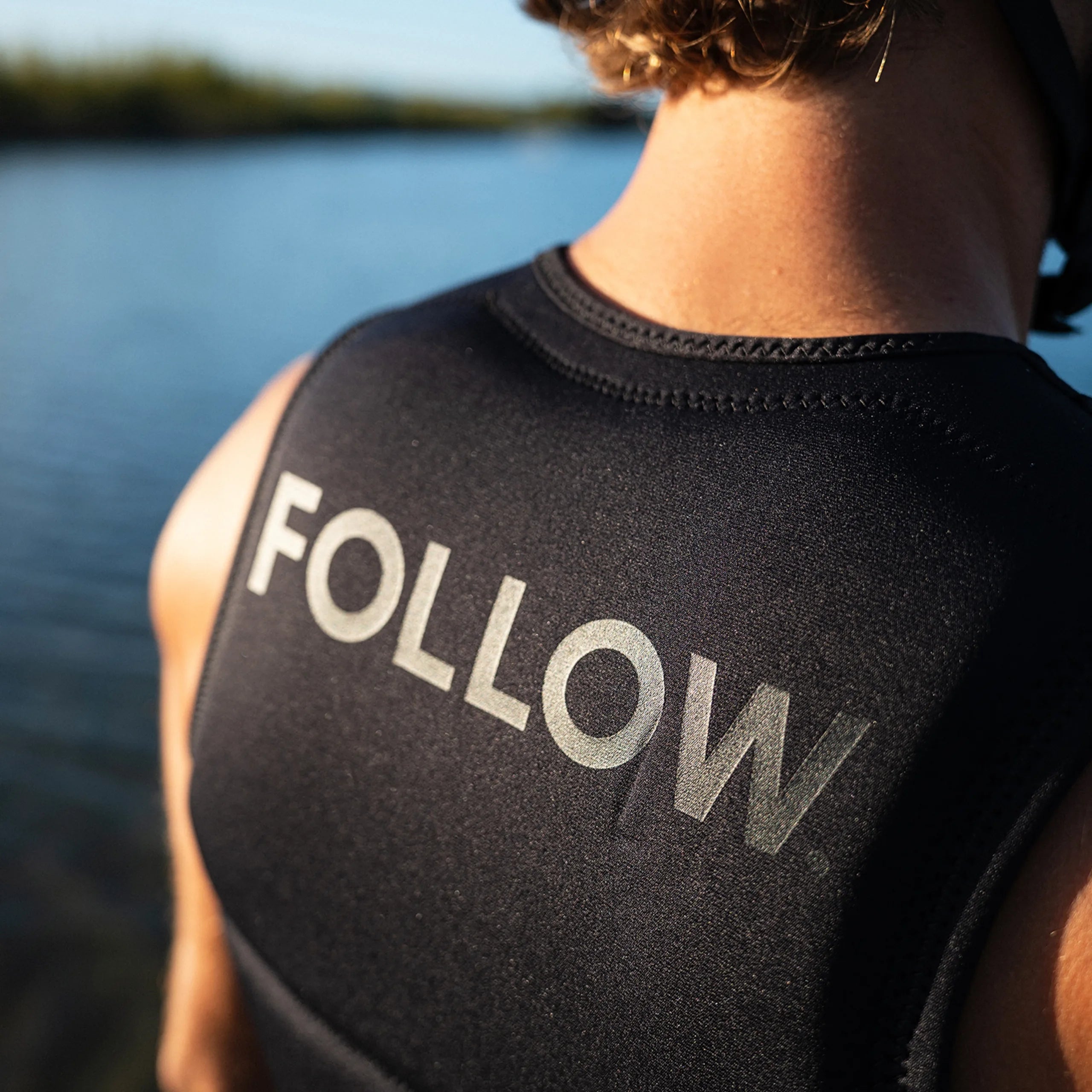 Follow Section Men's Life Jacket - Black/Petina in use